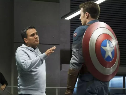 Joe Russo (à esq.) dirige Chris Evans em Capitão América 2 - O Soldado Invernal